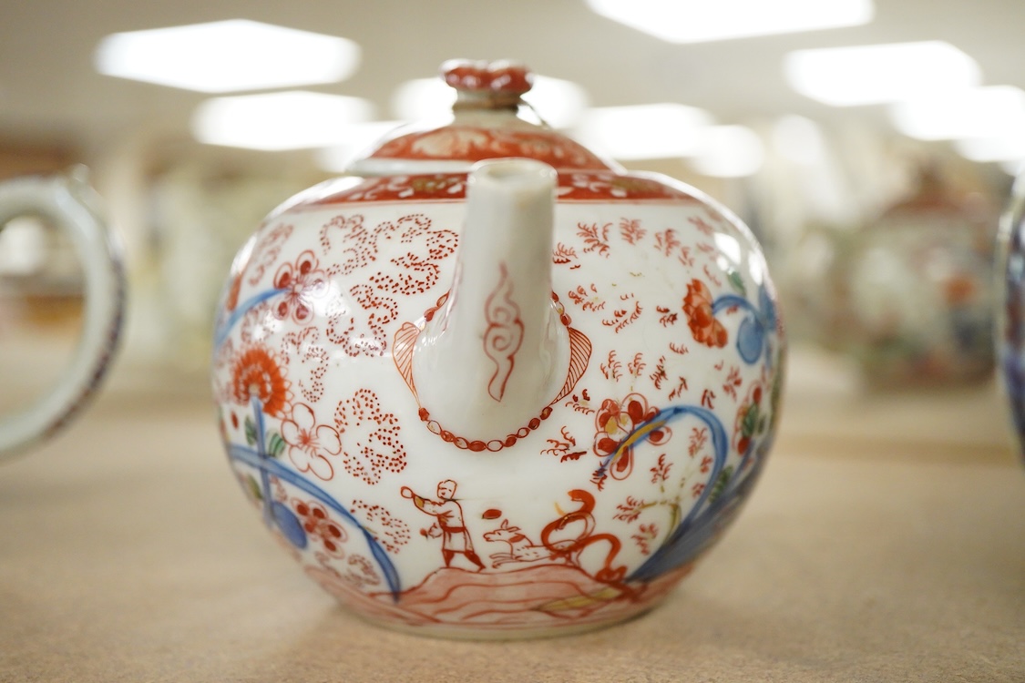 Three 18th century Chinese porcelain European enamelled teapots and covers, tallest - 13cm high